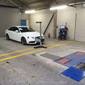 White Audi headlight alignment