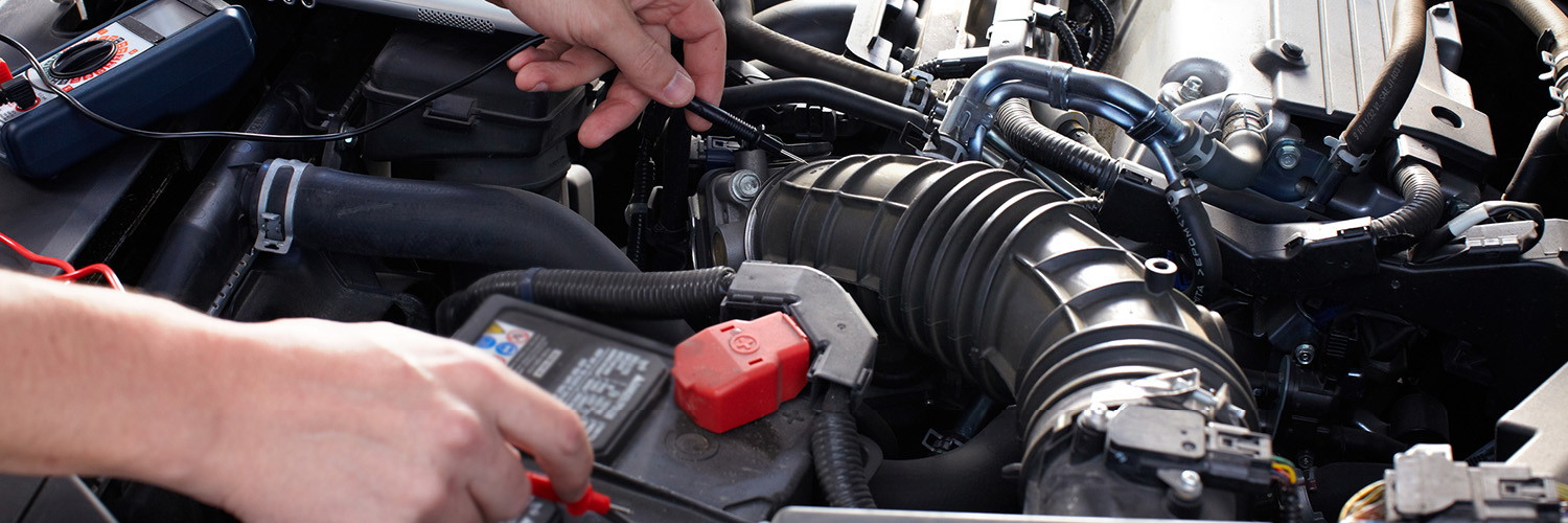 Checking electrics on car engine